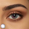 Galaxy Violet contact lens with cosmic violet pattern in a natural brown eye