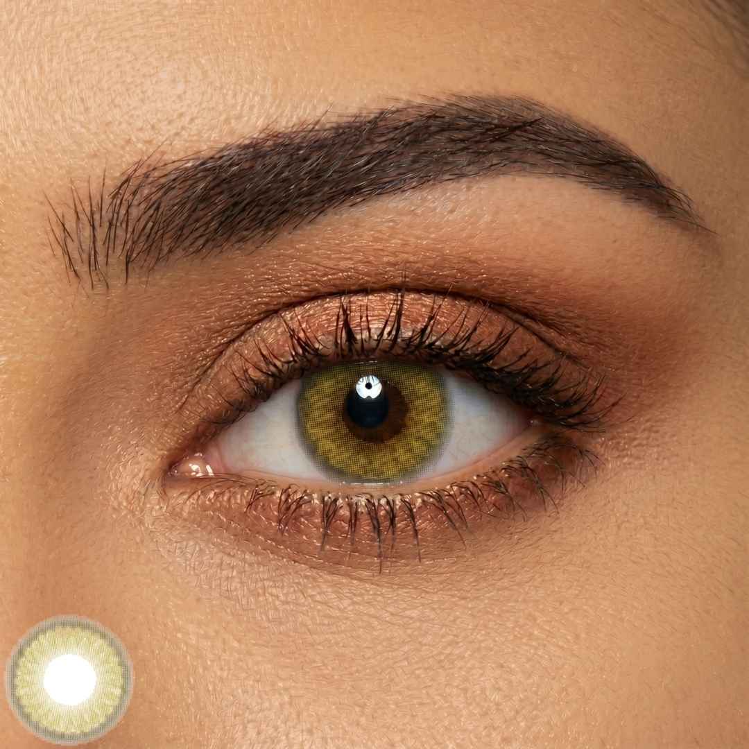 Close-up of an eye with a olive contact lens